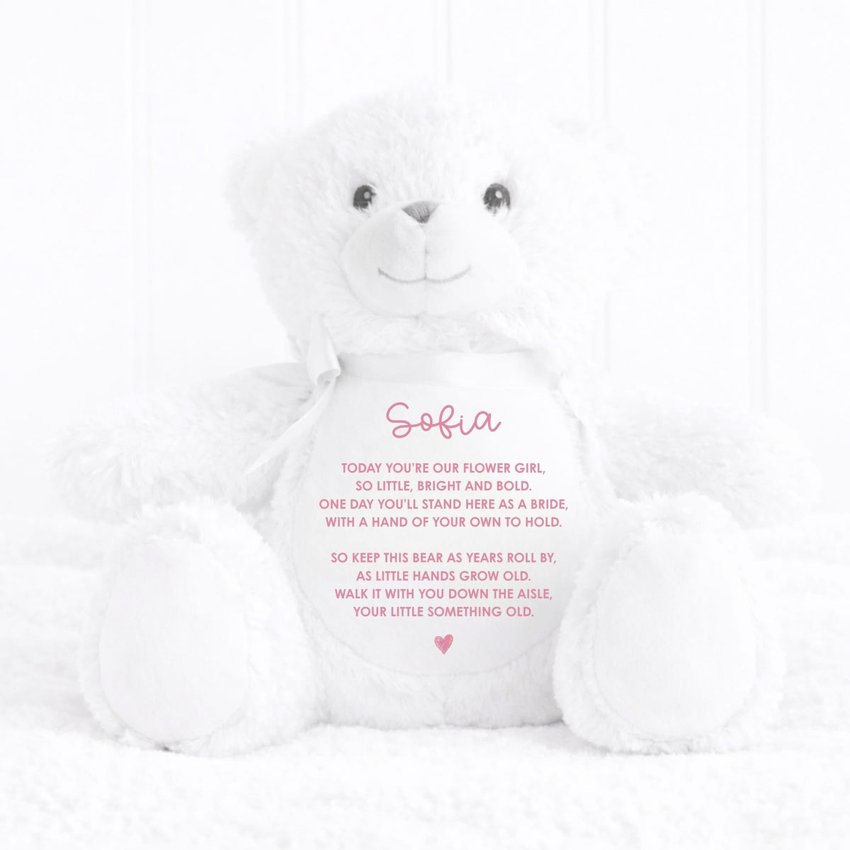 White teddy bear with personalized message on a white background