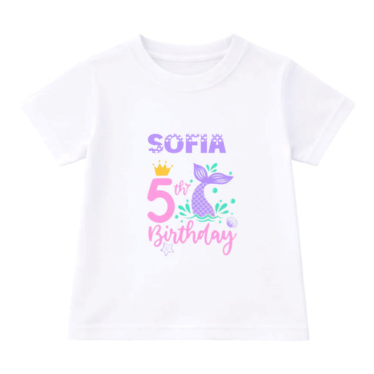 White t-shirt with a mermaid-themed birthday design on a white background